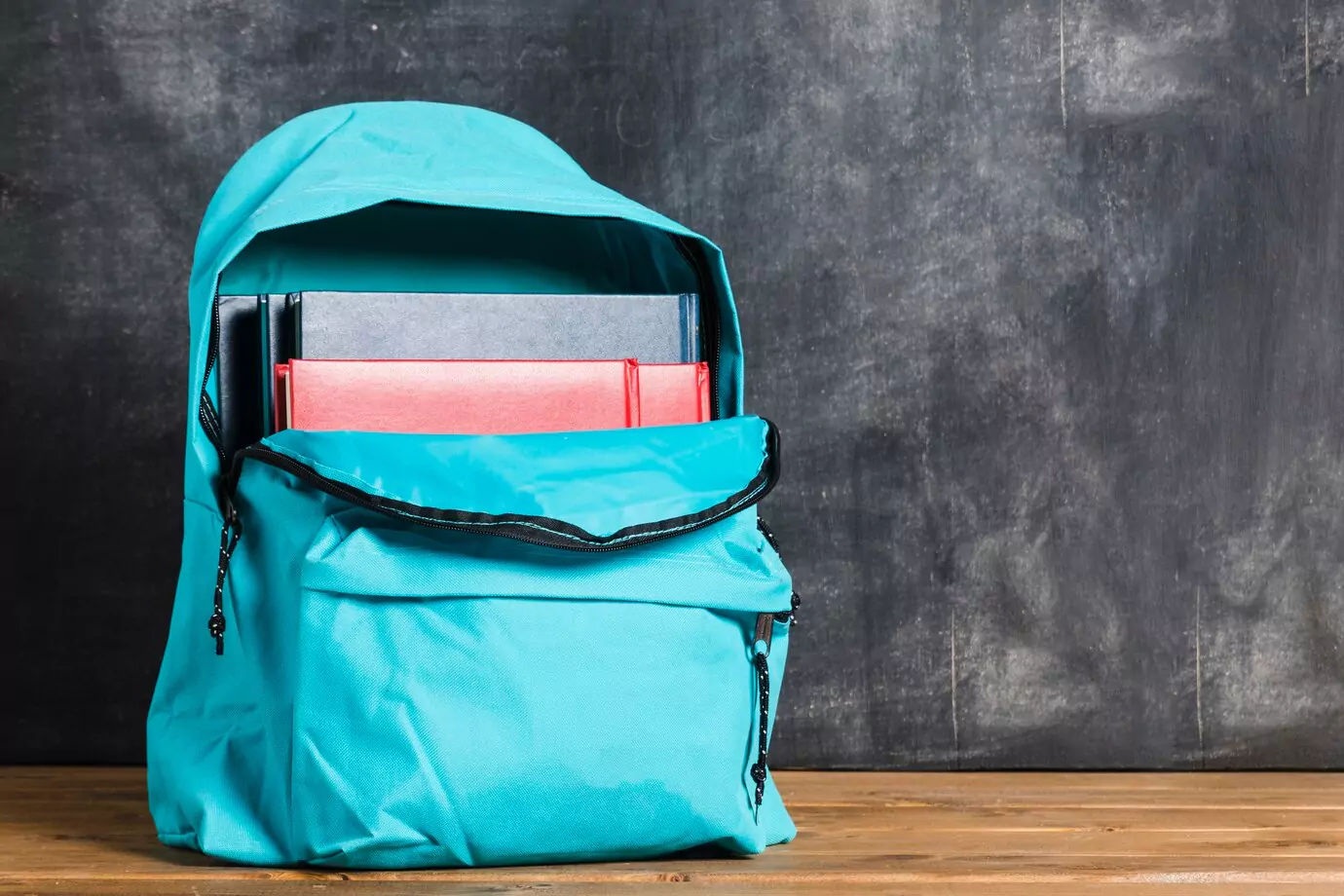 blue-backpack-with-textbook